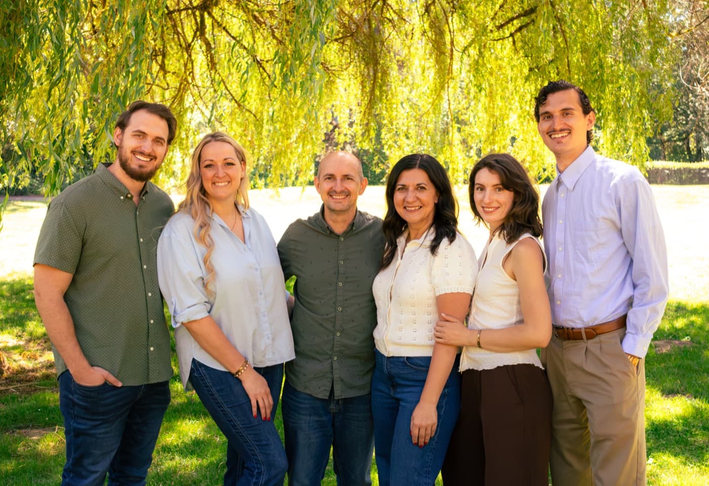 The Ovella Living team — a family with roots in caregiving, standing together outdoors